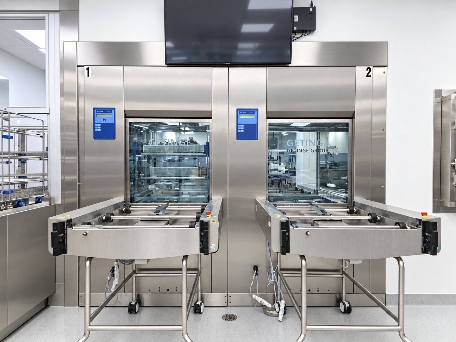 Stainless-steel washer-disinfectors with instrument racks and loading trolleys